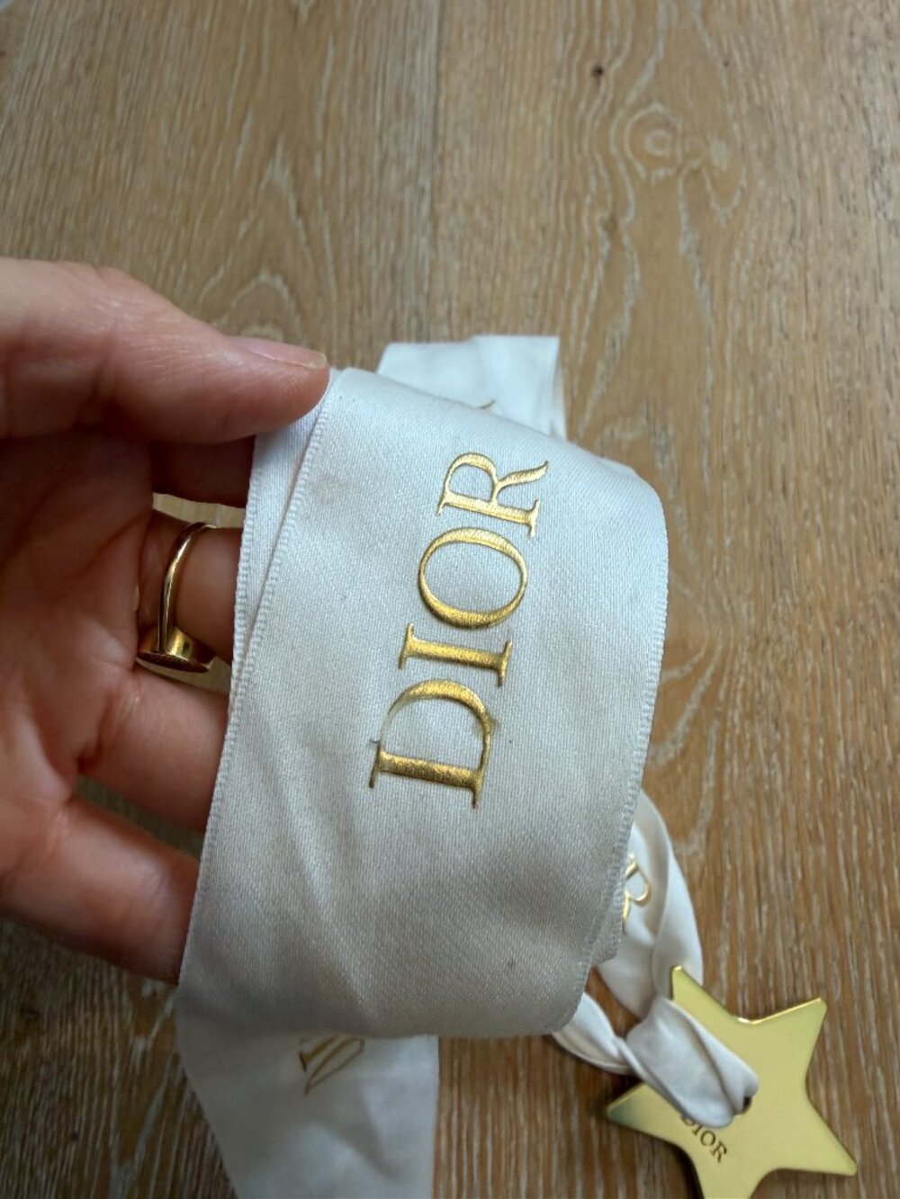 Dior Gold Star Ornament with White DIOR Logo Ribbon - Bag Charm